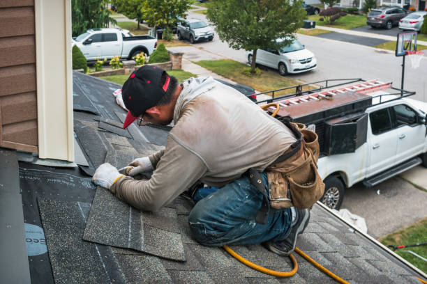 Professional Emergency Roof Repair technician working in Pewaukee, WI